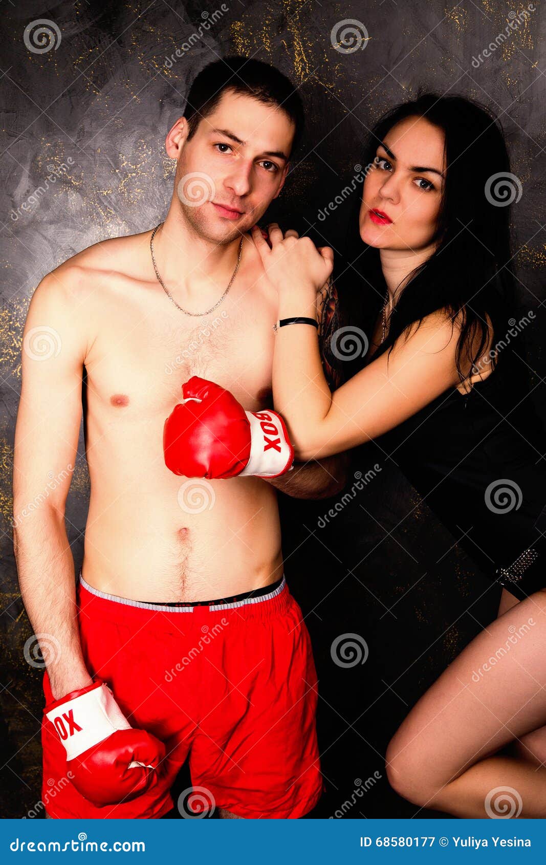 Young Beautiful Couple of Brunette Woman and Handsome Boxer Man Stock Image  photo