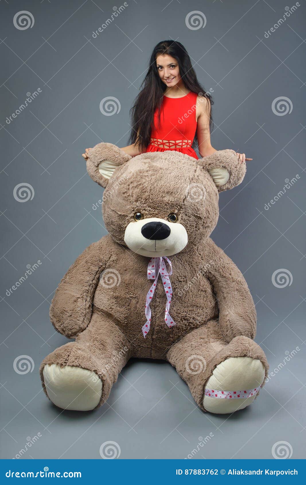 Young Beautiful Girl in Red Dress with Big Teddy Bear Soft Toy ...