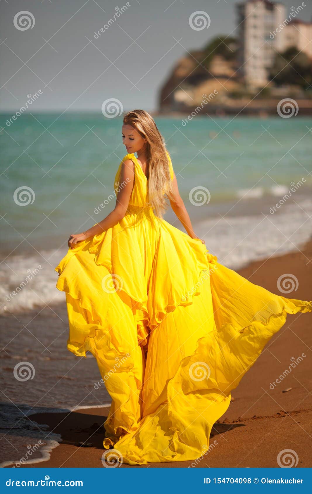 Young Beautiful Girl Walks Op the Sandy ...