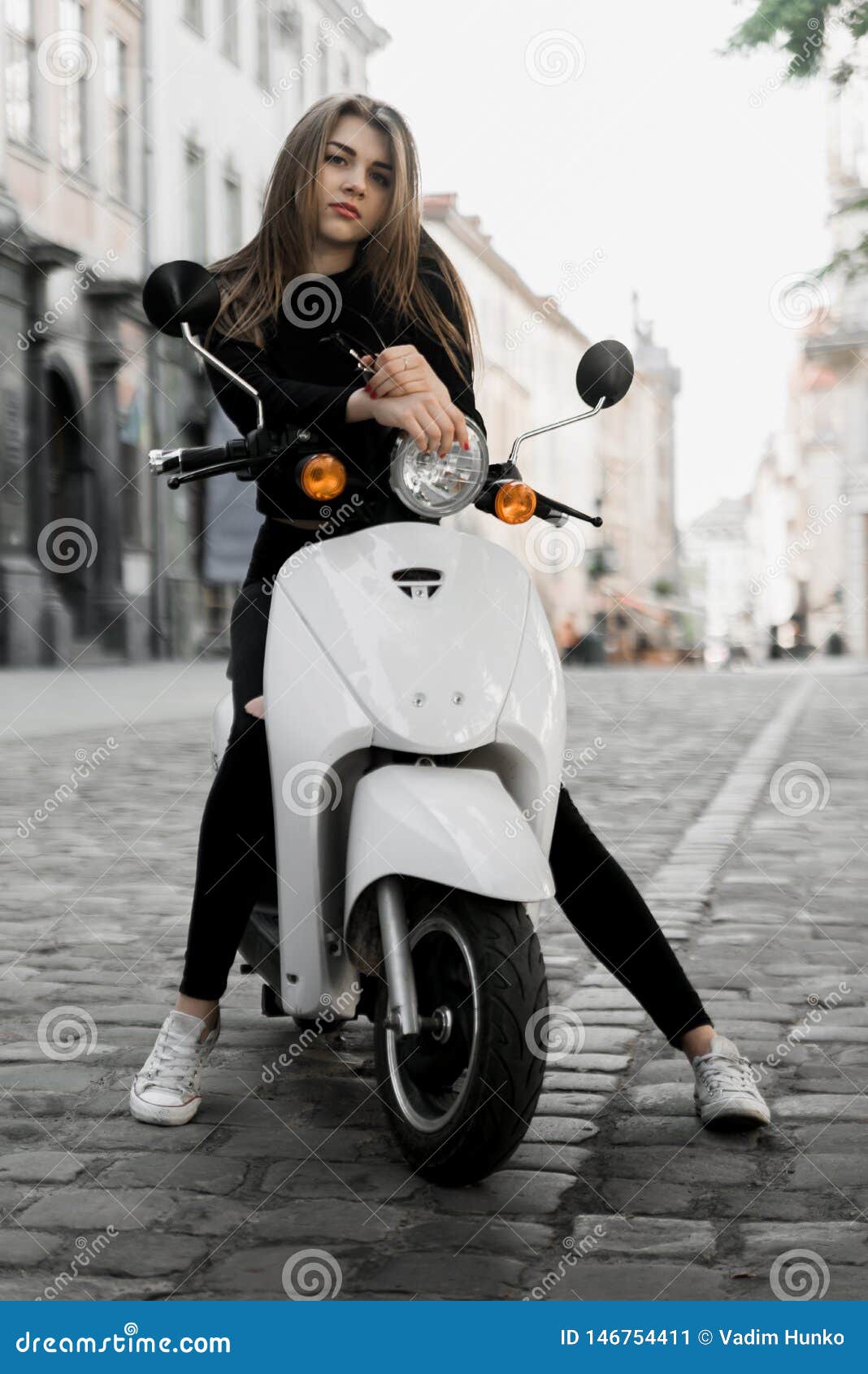 Young Girl with Scooter in European City Stock Image - of cool, helmet: 146754411