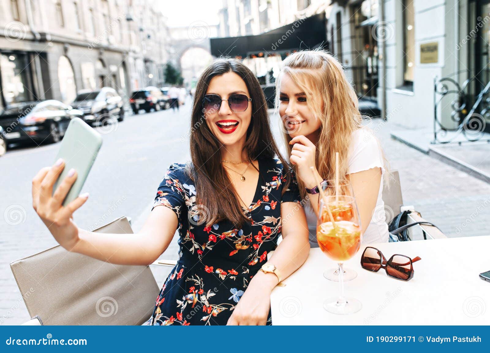 Young Beautiful Girls Takes Selfie In A Cafe Outdoor Stock Image Image Of Female Meeting 