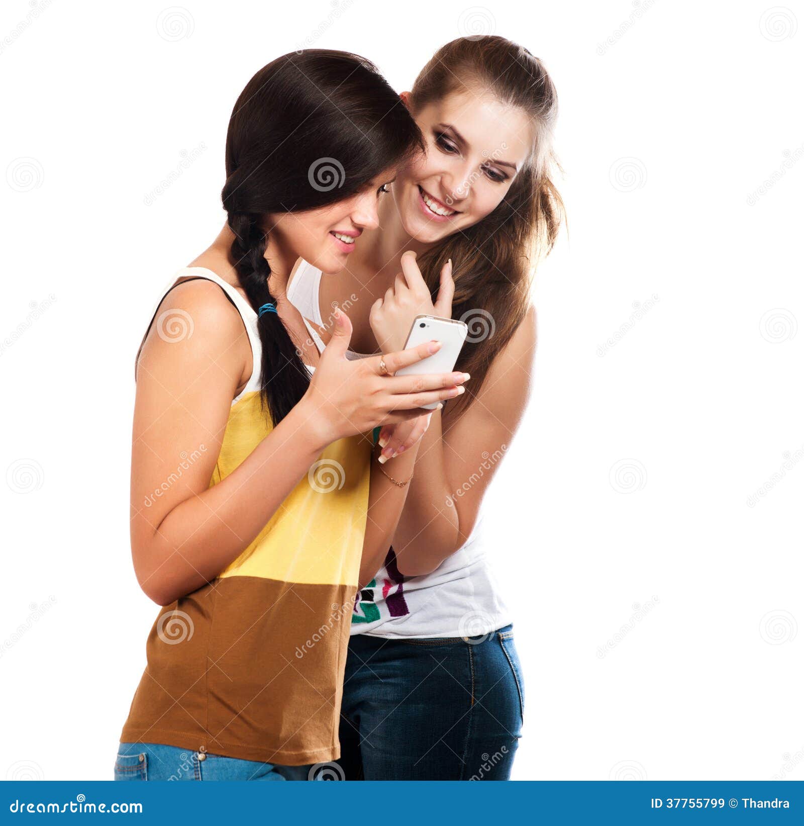 young beautiful girls using the cellphone to send and receive sms