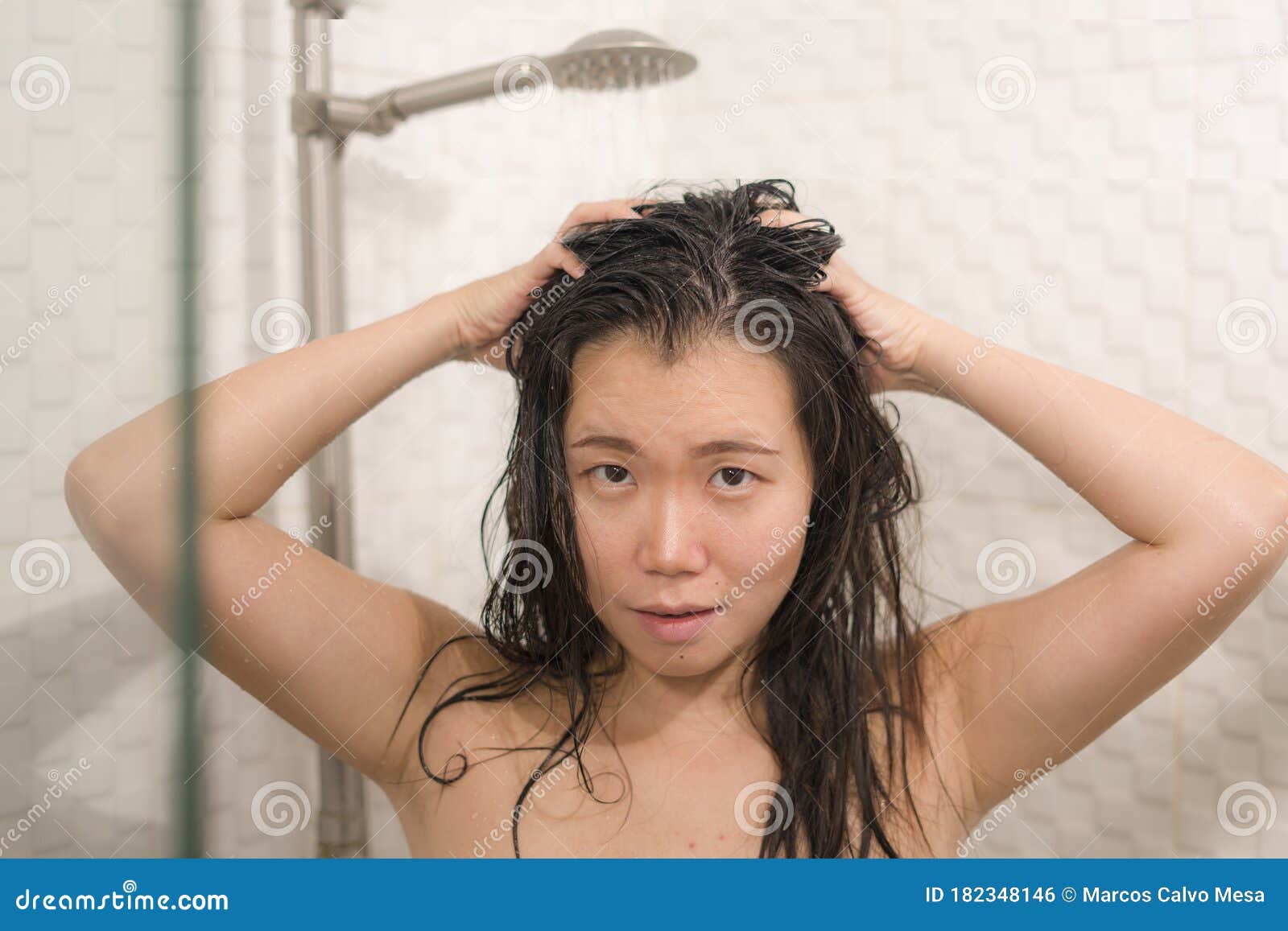 Young Beautiful And Happy Asian Korean Woman Taking A Shower In The Bathroom Washing Her Hair