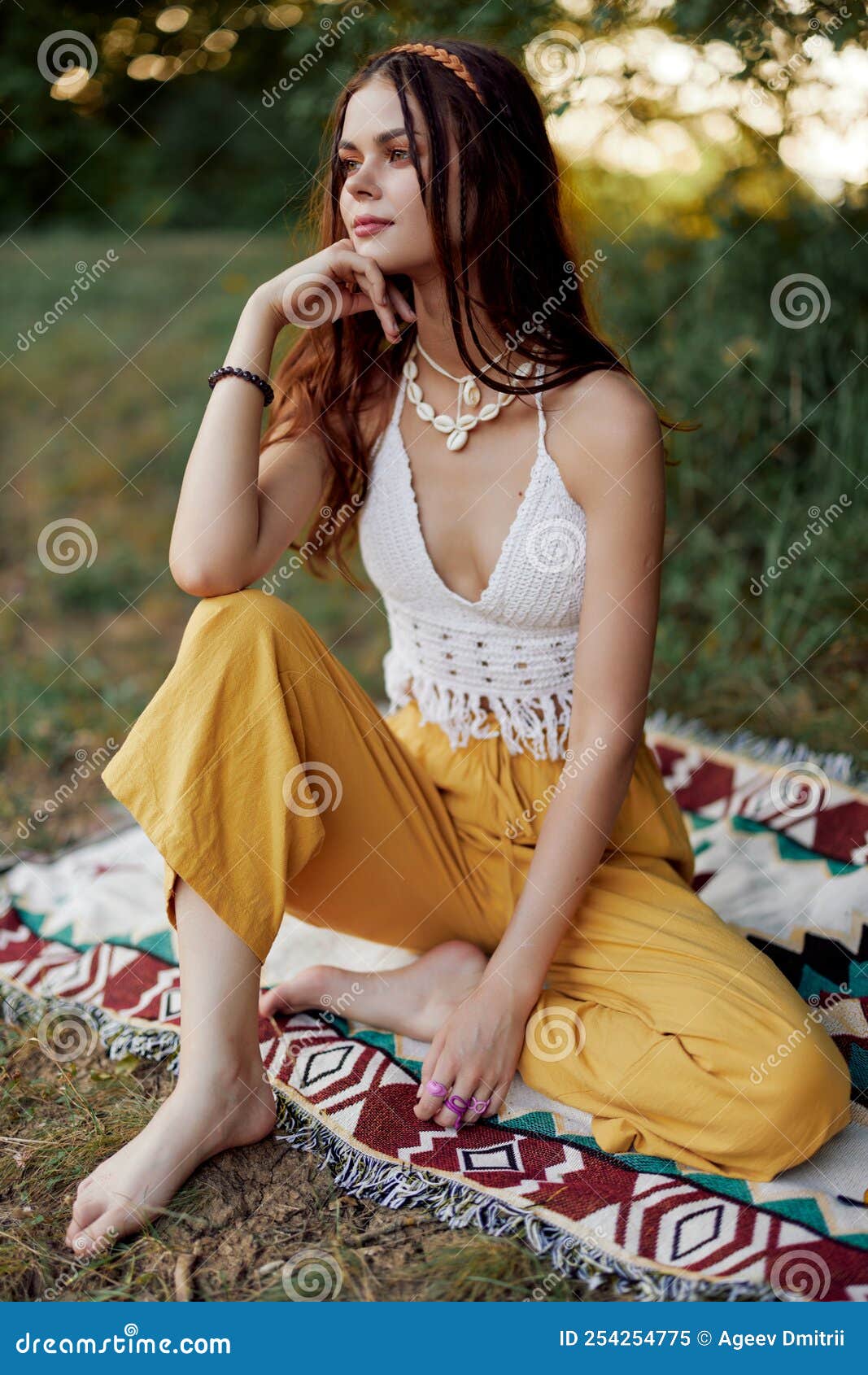 Young Beautiful Hippie Woman Sitting on the Ground in Nature in the ...