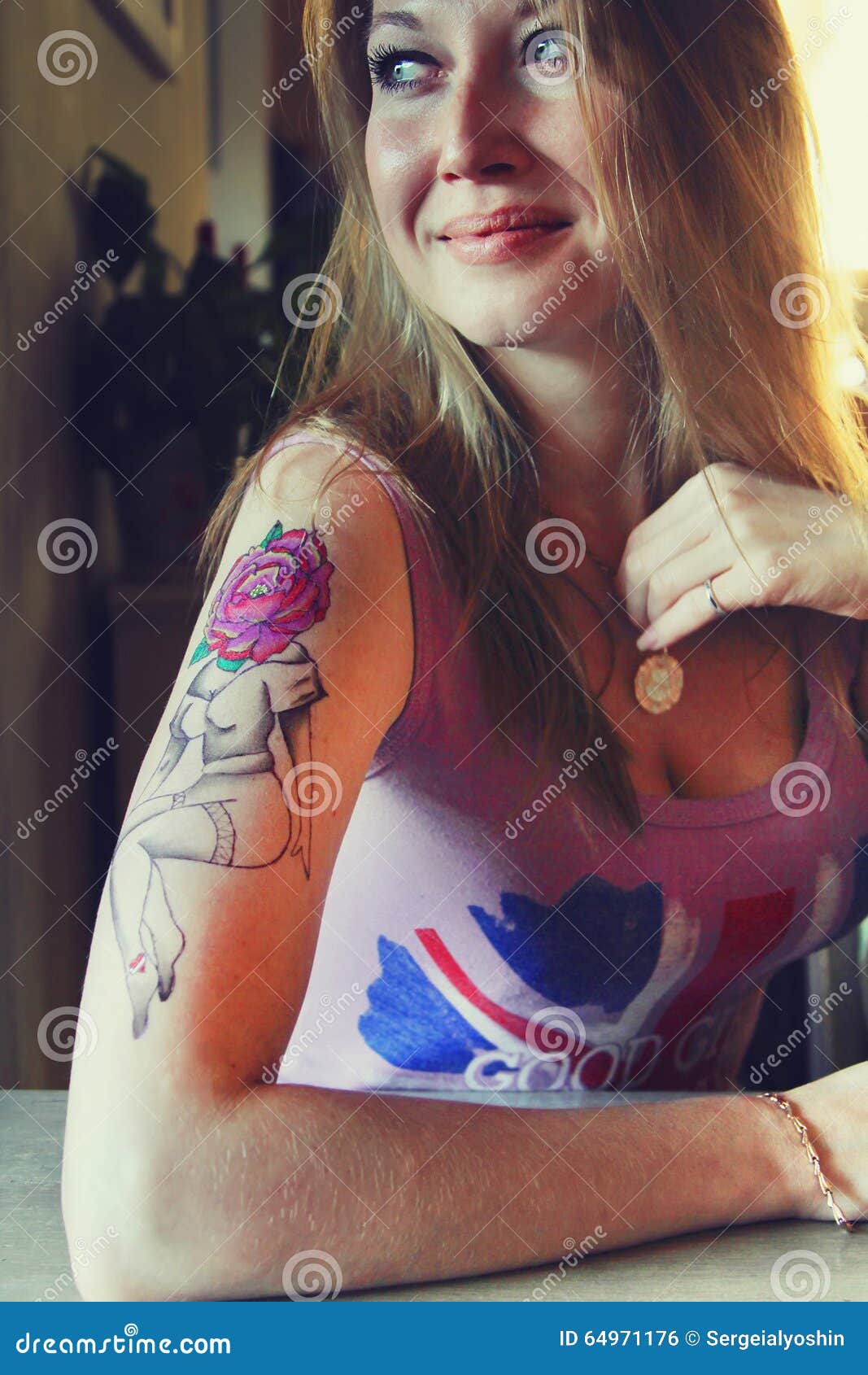 Young Beautiful Hipster Woman With Blonde Hair And Tattoo Hands In Cafe Stock Photo 64971176 Megapixl