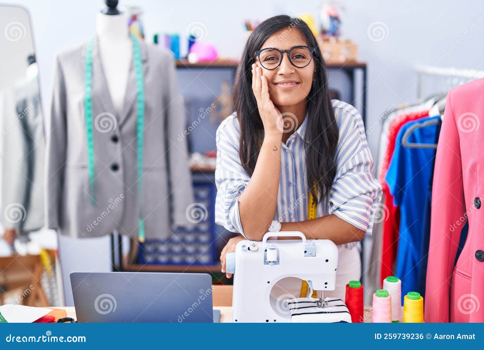 Young Beautiful Hispanic Woman Tailor Smiling Confident Leaning on ...