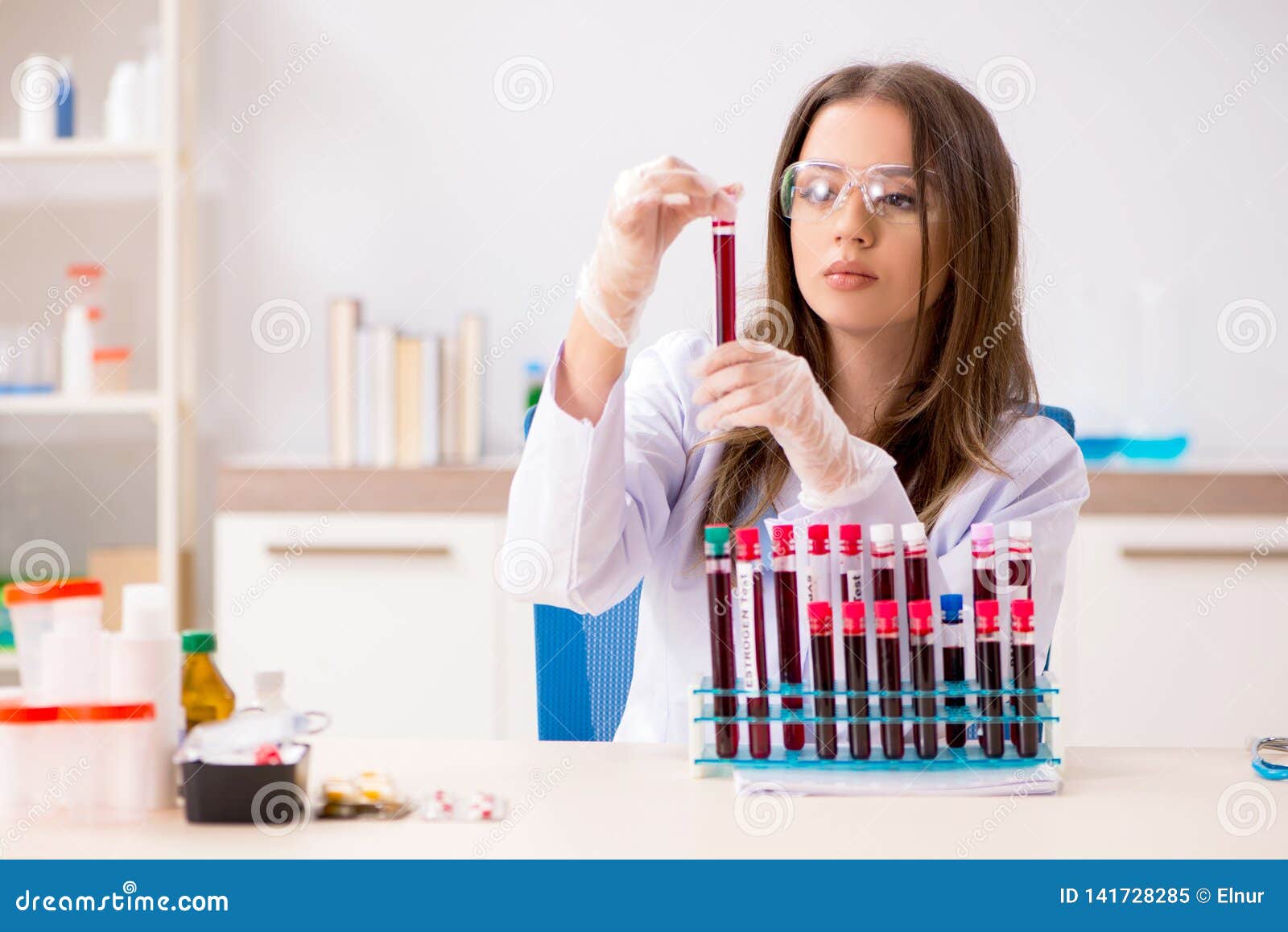The Young Beautiful Lab Assistant Testing Blood Samples Stock Image ...