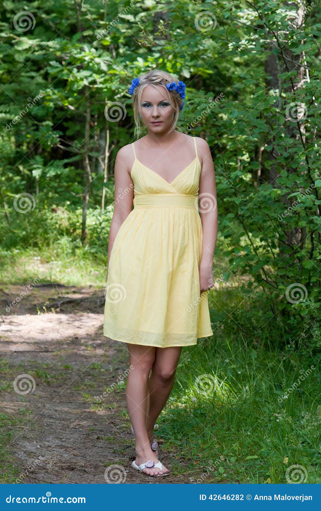 Young Beautiful Lady in Yellow Dress in Stock Photo - Image of calm ...