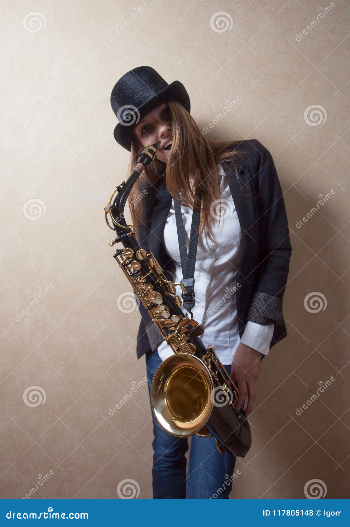 Young Beautiful Long Haired Blonde with Saxophone. Stock Photo Image