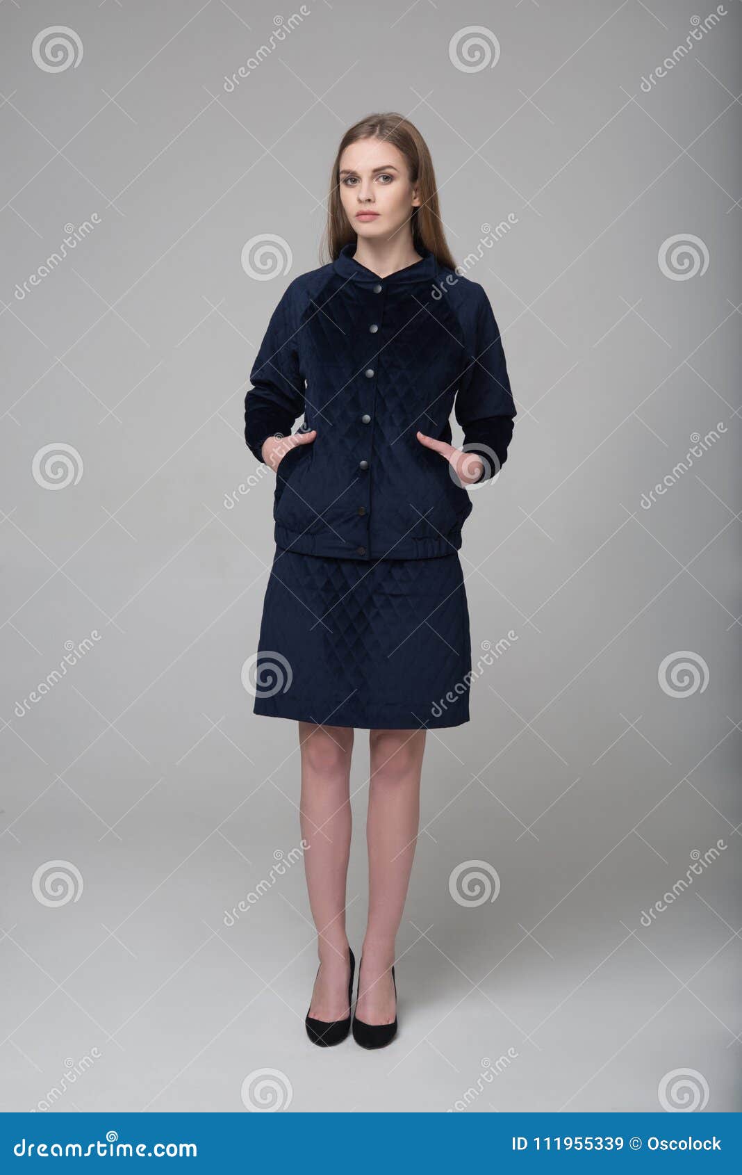 Young Beautiful Long-haired Female Model Poses in Black Suit Stock