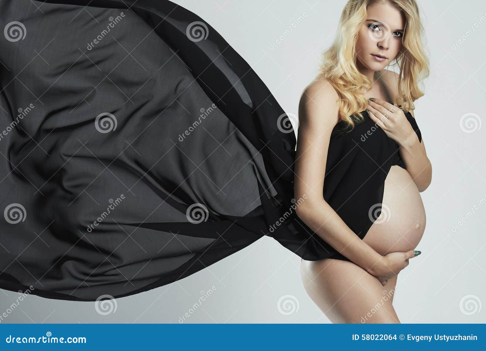 young-beautiful-pregnant-woman-flying-fabric-glamour-style-art-fashion-portrait-blonde-girl-big-belly-58022064
