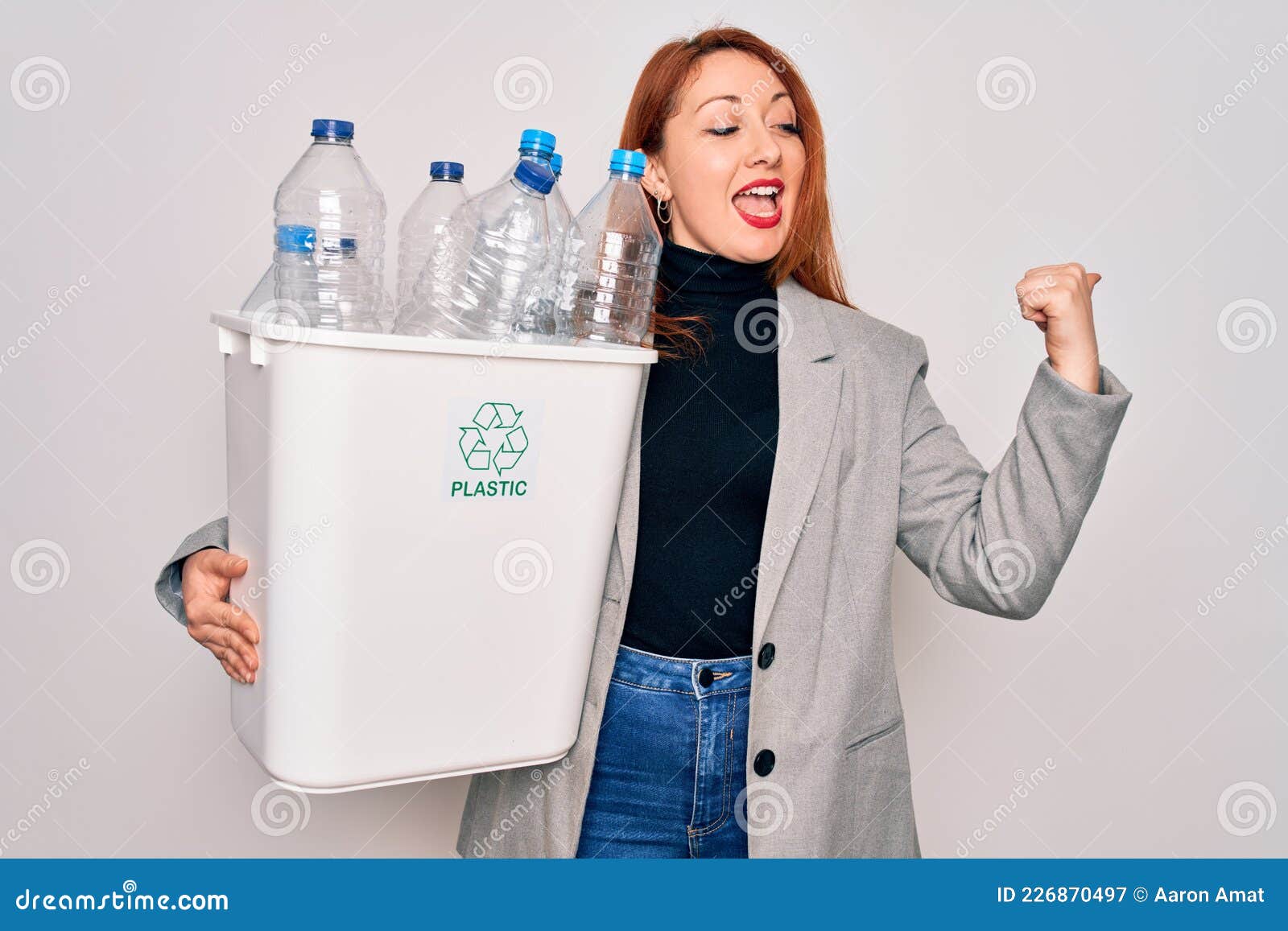 Young Beautiful Redhead Woman Recycling Holding Trash Can with Plastic ...