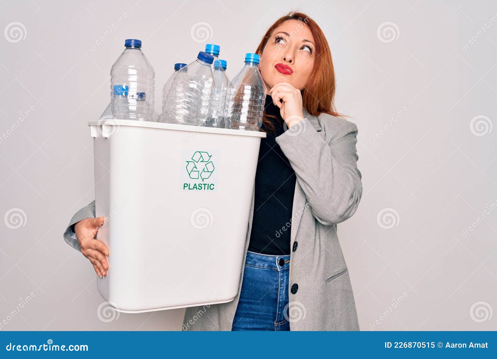 Young Beautiful Redhead Woman Recycling Holding Trash Can with Plastic ...