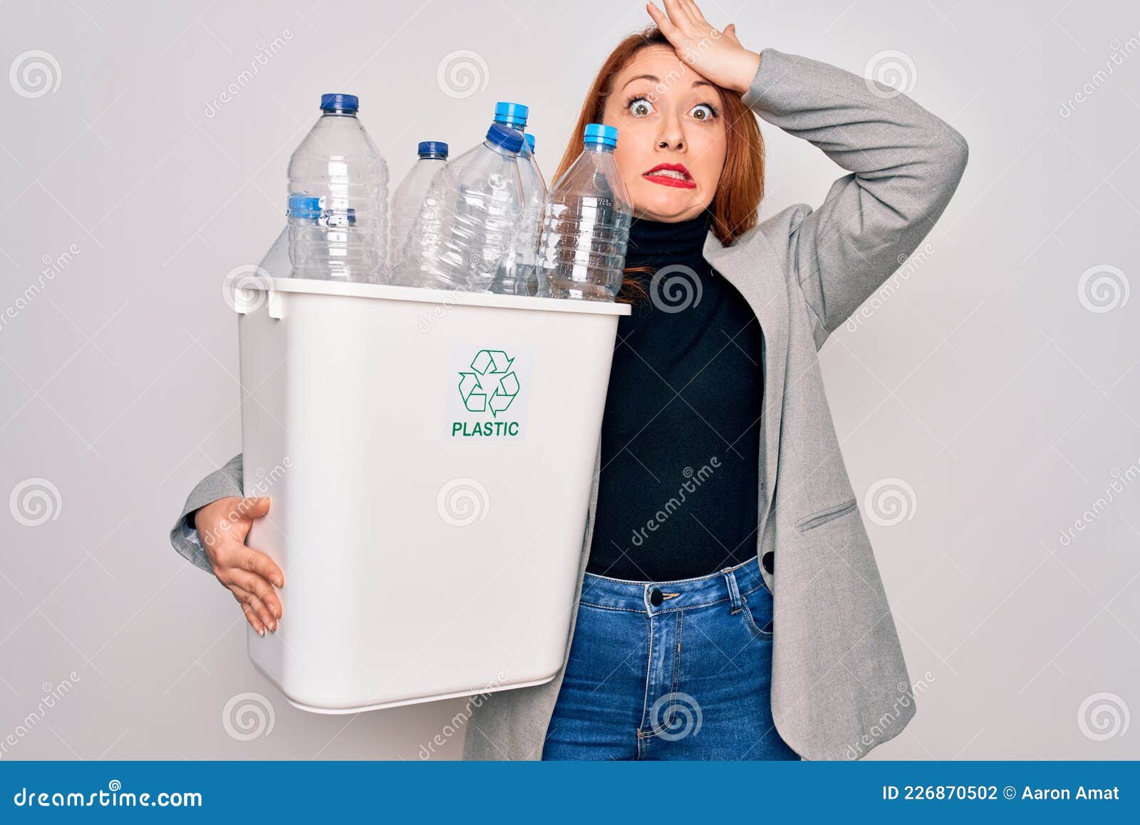 Young Beautiful Redhead Woman Recycling Holding Trash Can with Plastic ...