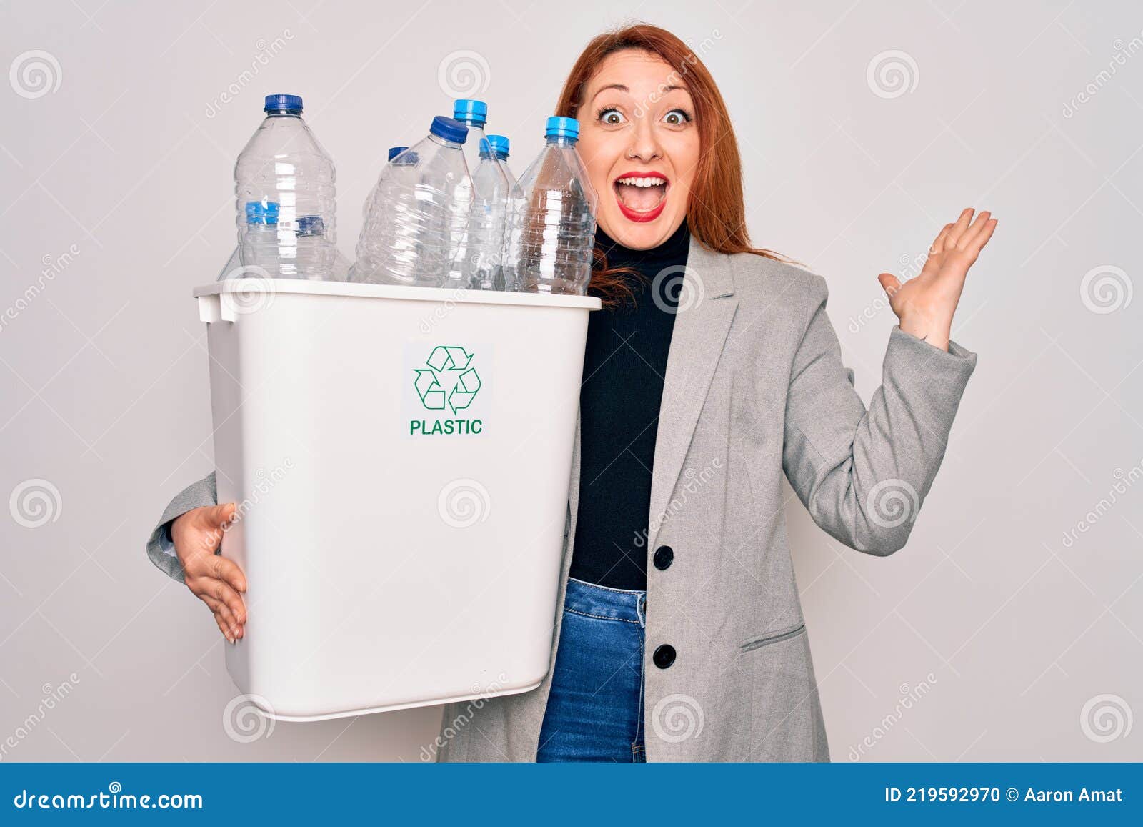 Young Beautiful Redhead Woman Recycling Holding Trash Can with Plastic ...