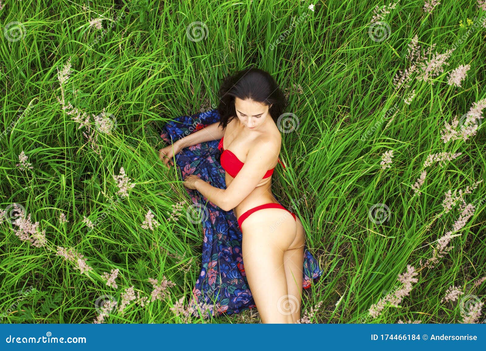 Erotic woman in grass