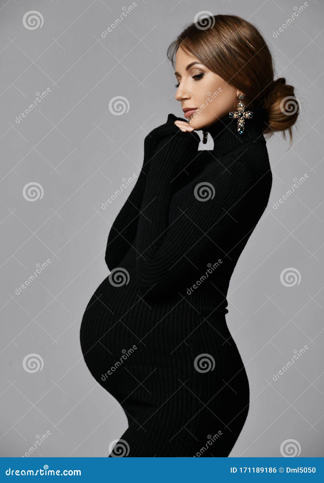 Young Beautiful Slim Pregnant Woman with Long Hair in Black Body and ...