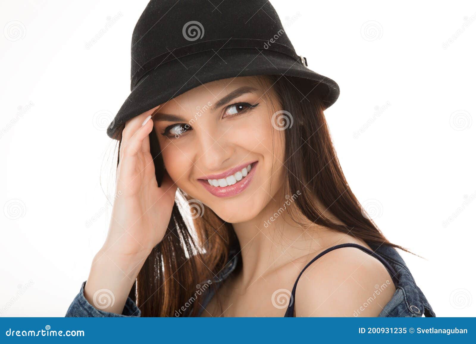 Young Beautiful Smiling Woman in Black Hat, Looking To the Side Smiling ...