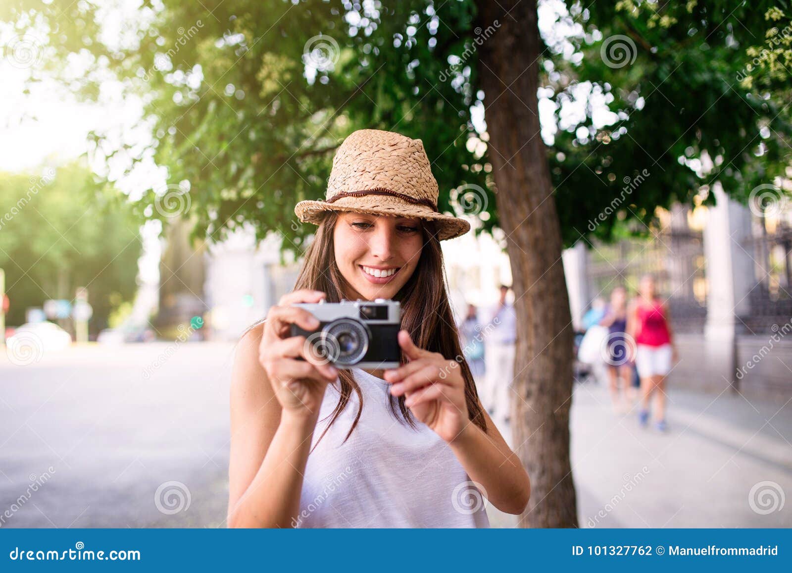 Young Beautiful Tourist Woman Using a Photo Camera Stock Photo - Image ...