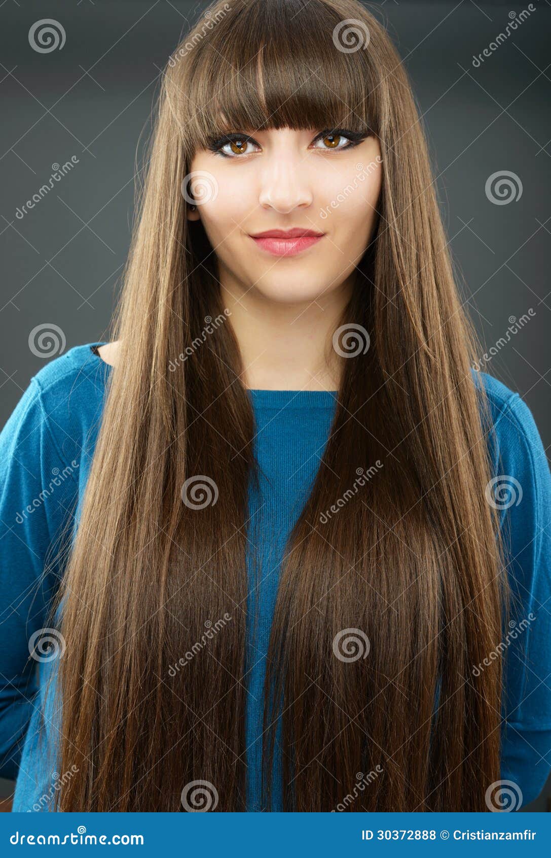 A Young Beautiful Woman With Bangs In Studio Royalty Free 