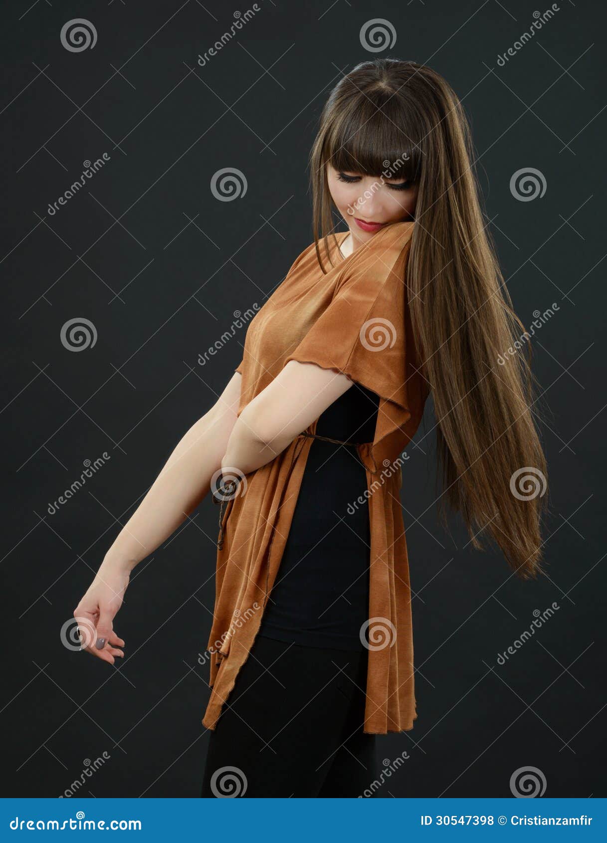 A Young Beautiful Woman with Bangs in Studio Stock Photo - Image of ...