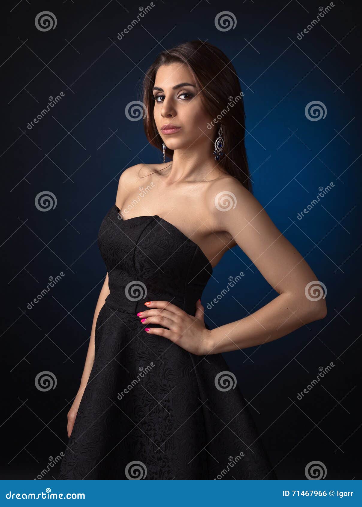 Young Beautiful Woman on Dark Blue Background Stock Photo - Image of