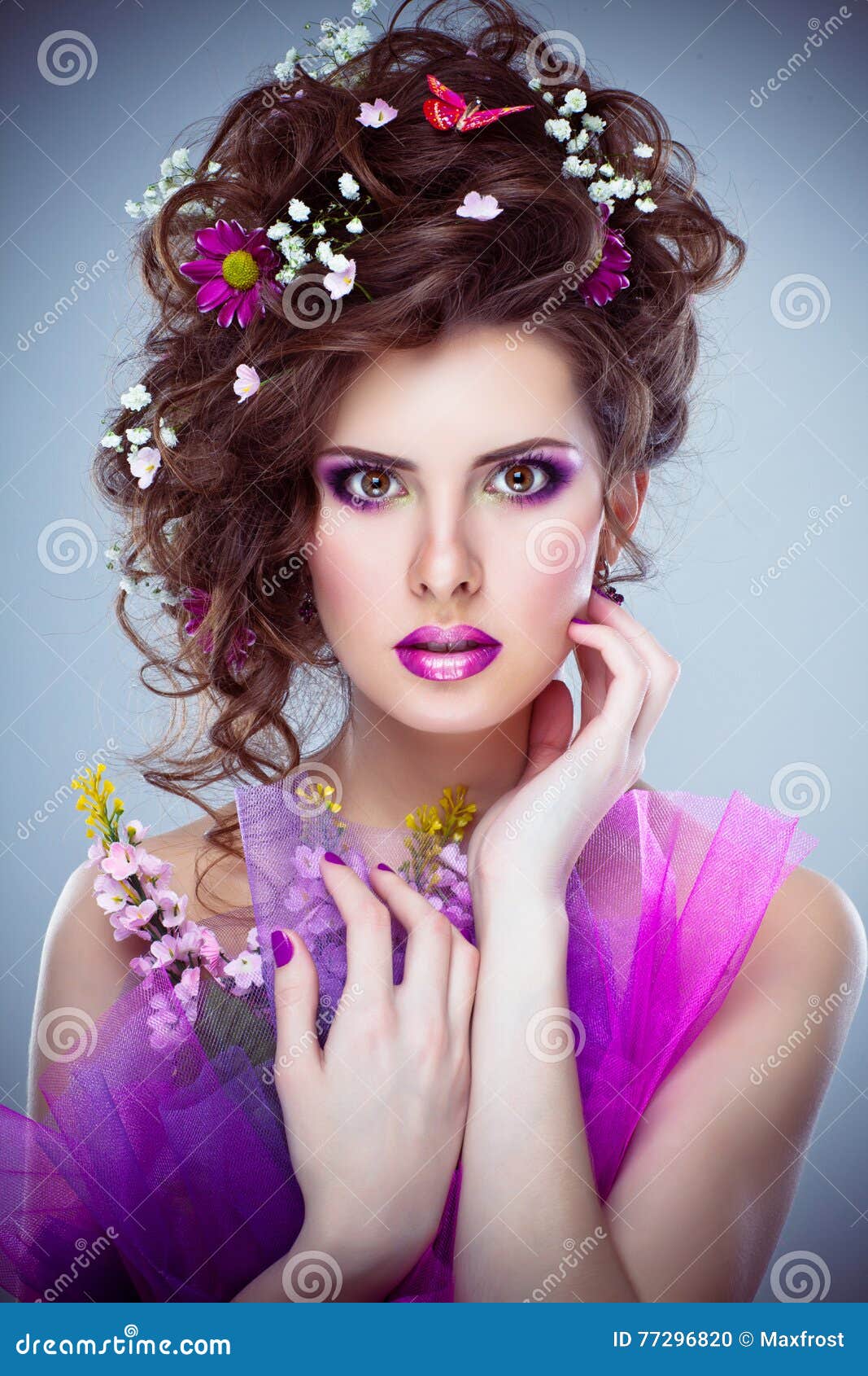 Young Beautiful Woman with Flowers in Her Hair and Bright Makeup Stock ...