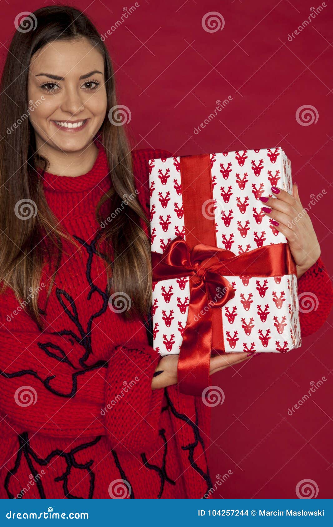 Young Beautiful Woman Holding A Christmas Gift Stock Photo - Image of ...