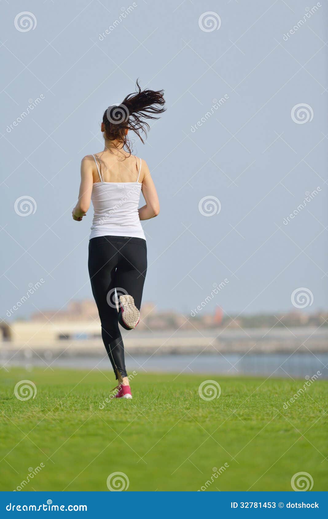 Young Beautiful Woman Jogging On Morning Stock Photos - Image: 32781453