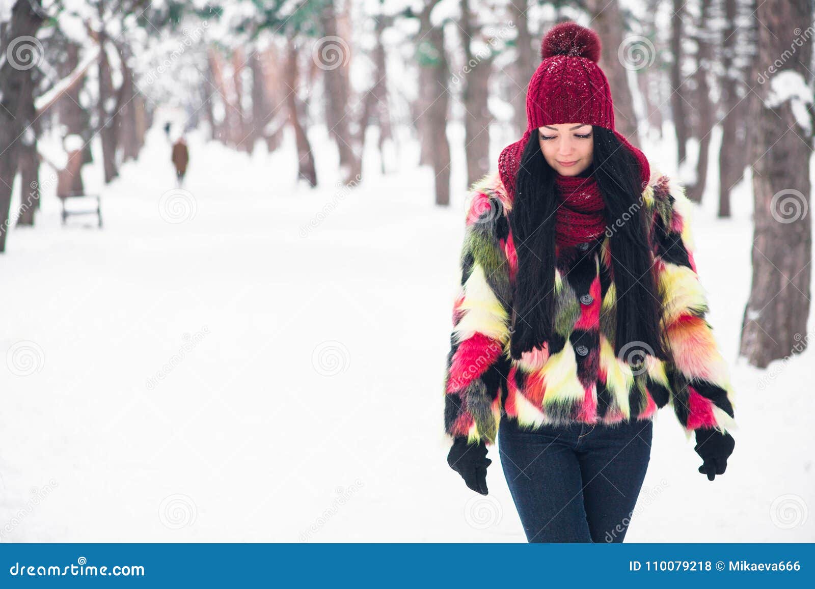 Young Woman in Multi-colored Fur Coat Stock Photo - Image of smile ...