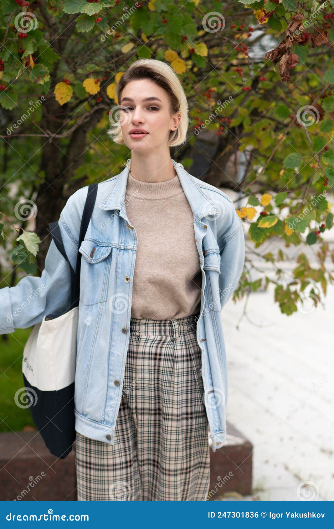 Young Beautiful Woman Pose Outside, Standing in a Blue Jacket Stock ...