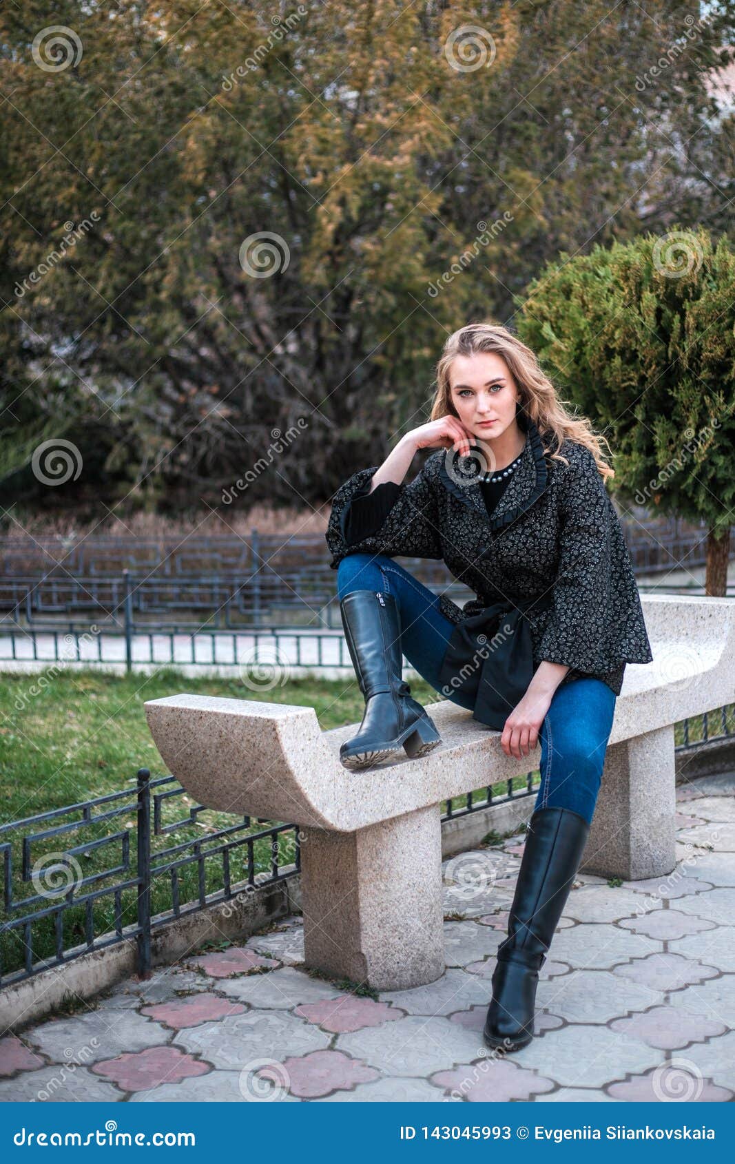 Young Beautiful Woman Posing at Camera Outdoors. Stock Image - Image of ...