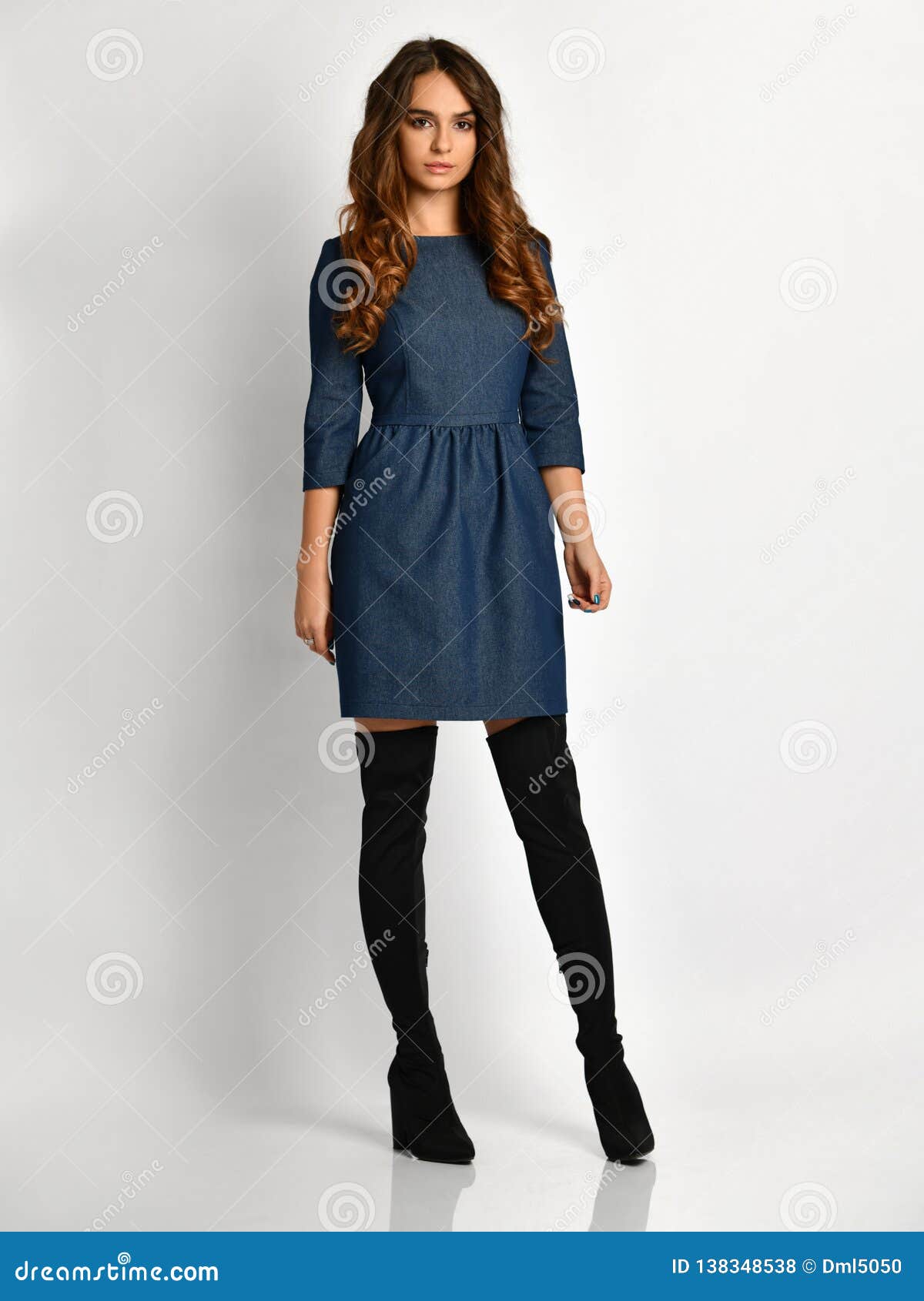 Young Beautiful Woman Posing in New Fashion Blue Jeans Pattern Winter ...