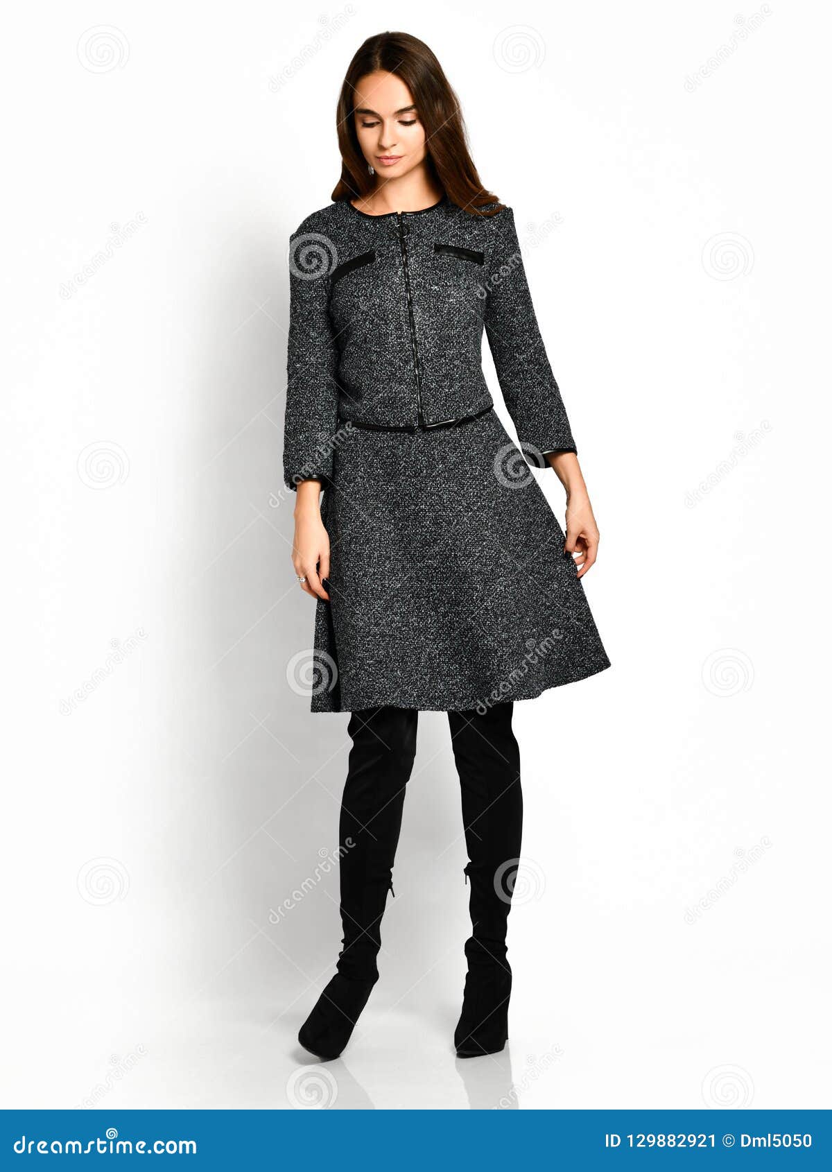 Young Beautiful Woman Posing In New Gray Fashion Winter Dress On High ...