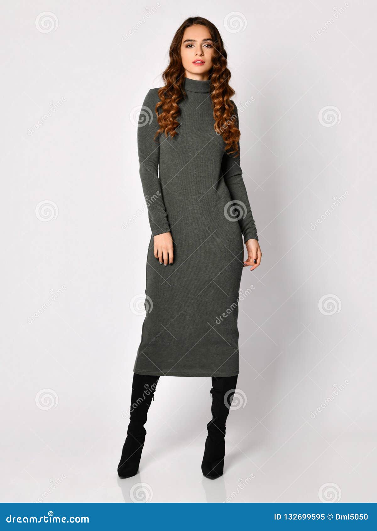 Young Beautiful Woman Posing in New Gray Fashion Winter Knitted Dress ...