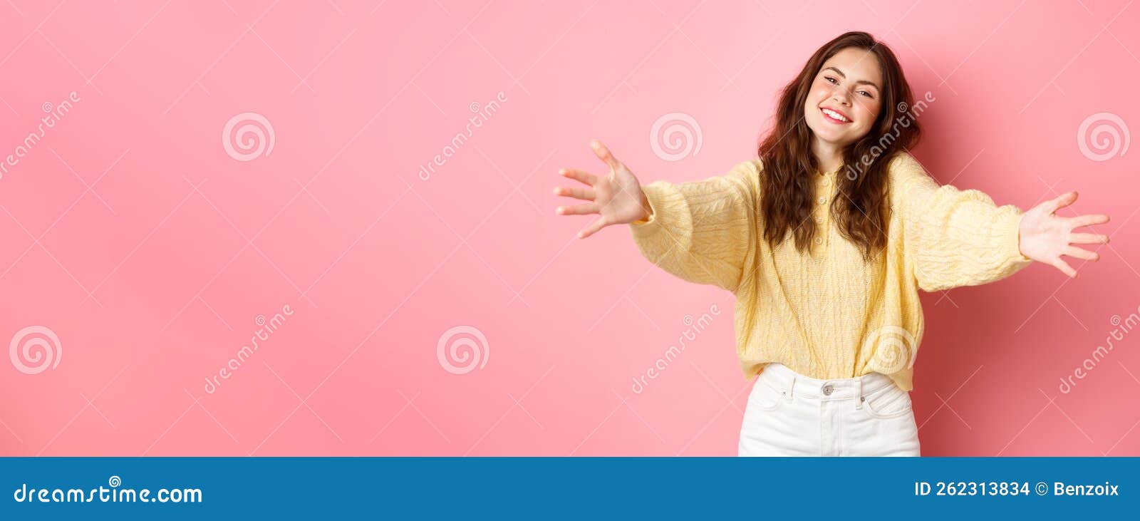 Young Beautiful Woman Reaching Hands Forward To Hug You Smiling