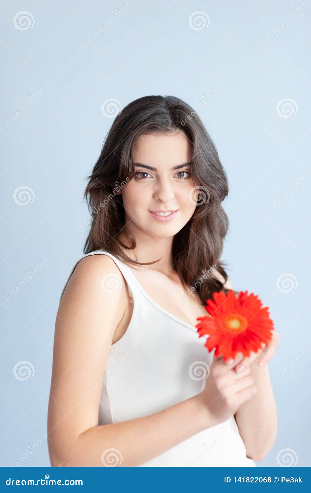 Young Beautiful Woman Relaxing With Gerbera Flower At Spa Isolated