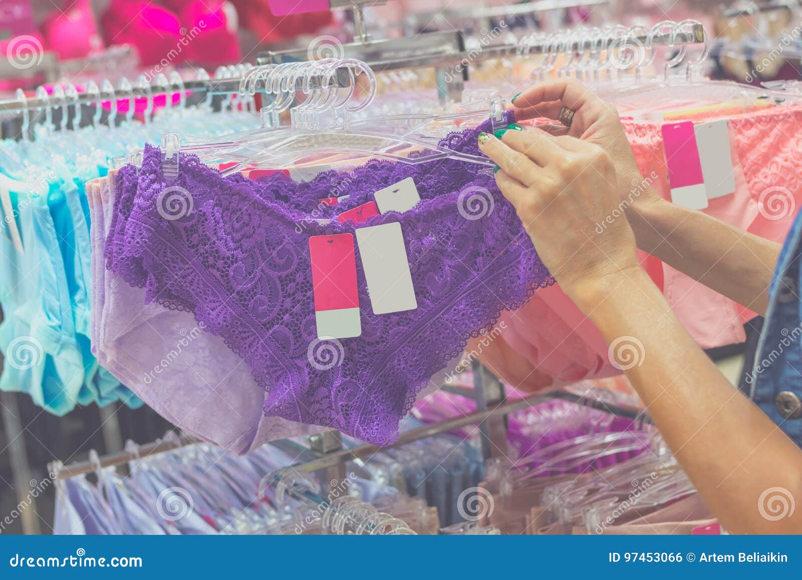 Young Beautiful Woman Shopping, Standing in the Mall, Choosing New