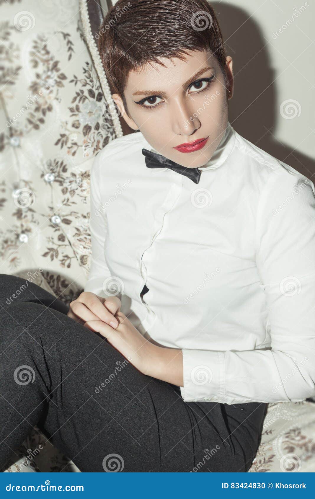 Young Beautiful Woman with Short Hair Style and Classic Wear with Bow Tie. Stock Photo - Image of haircut, crazy: 83424830 Young Beautiful Woman with Short Hair Style and Classic Wear with Bow Tie. Stock Photo - Image of haircut, crazy: 83424830