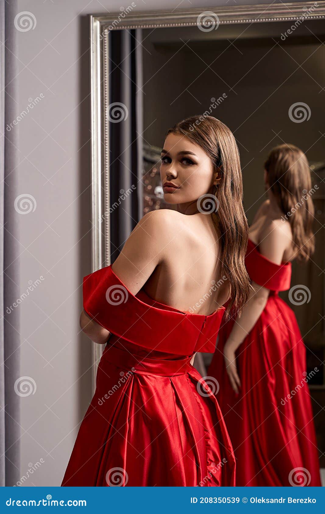 Young Beautiful Girl Wearing an Off-the-shoulder Full-length Crimson Red Satin Prom Ball Gown. Model Looking in Stock Image - Image of graduation, fitting: 208350539