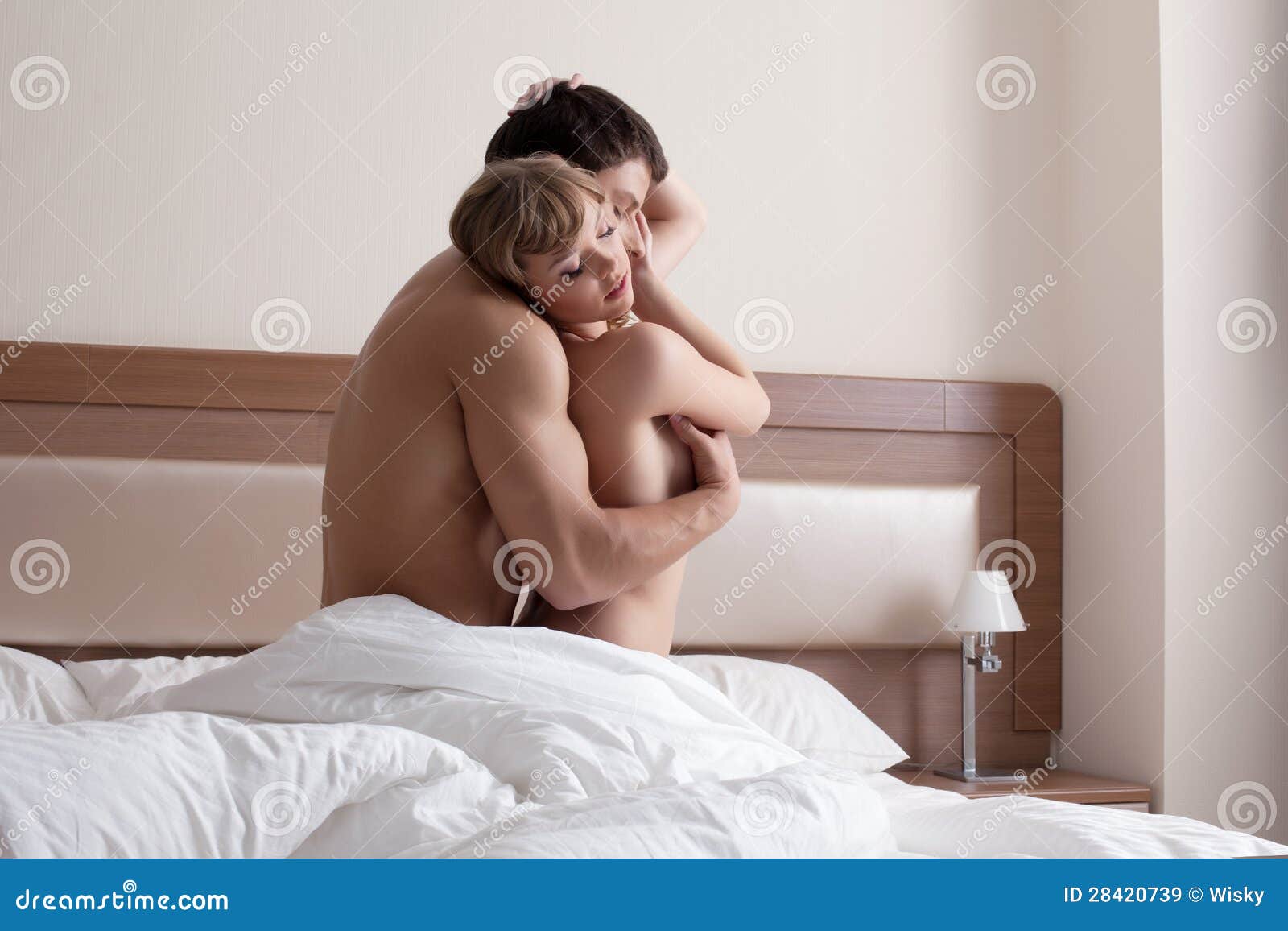 Young Beauty Couple Making Morning Sex in Bedroom Stock Image