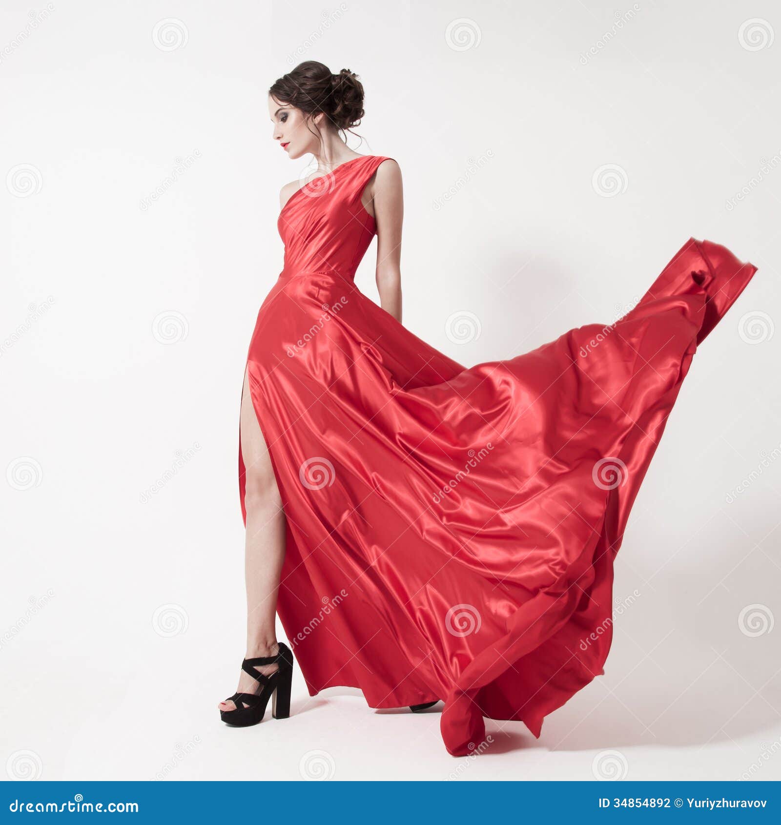 Young Beauty Woman in Fluttering Red Dress. White Background. Stock ...