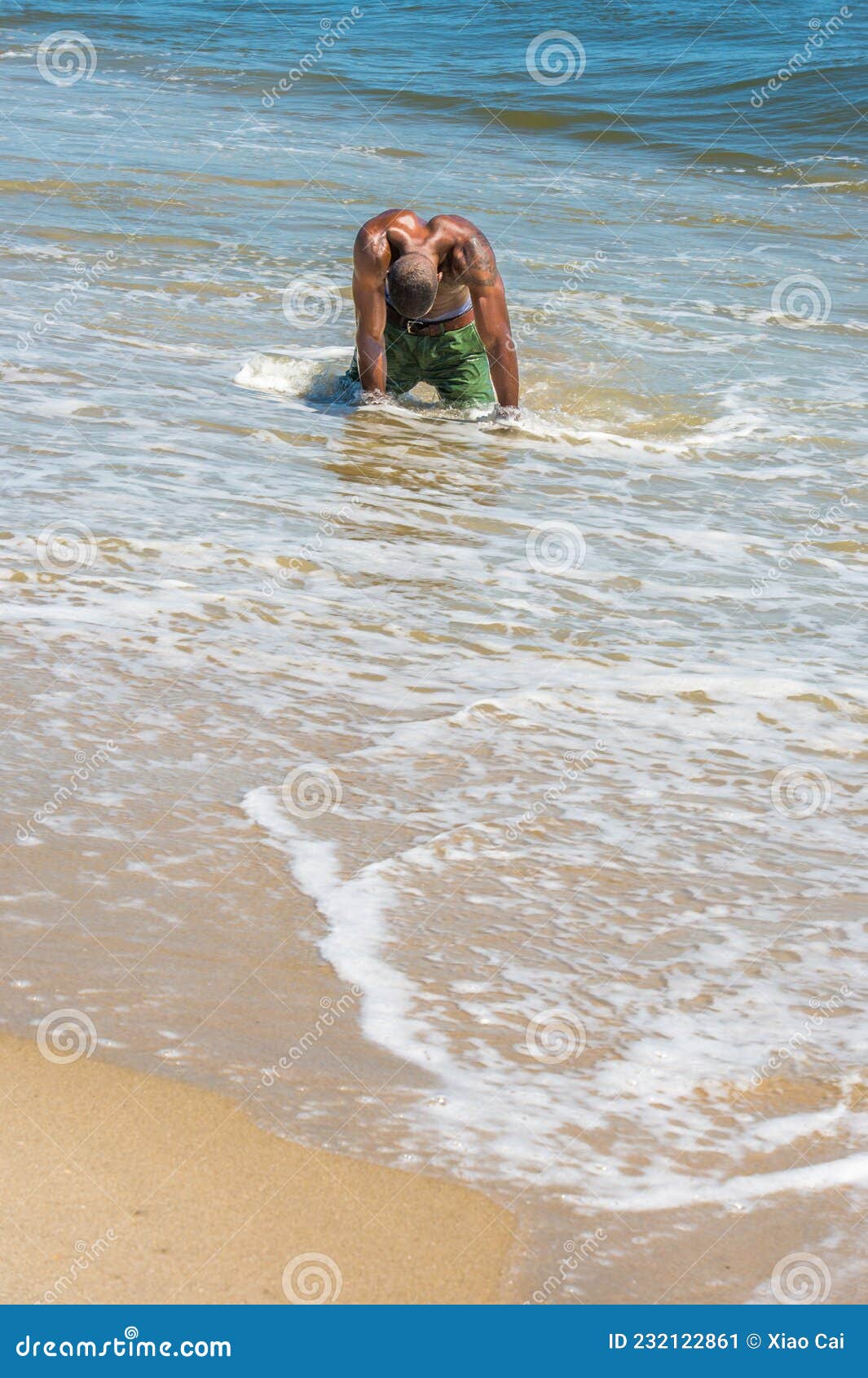 Young Black Man, Shirtless, Keeling Down on Water of Beach, Lowing His Head  Stock Image - Image of muscular, shore: 232122861