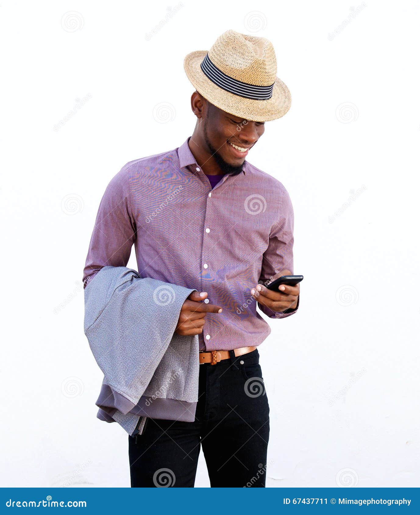 young black guy using mobile phone portrait sending text message against white background 67437711