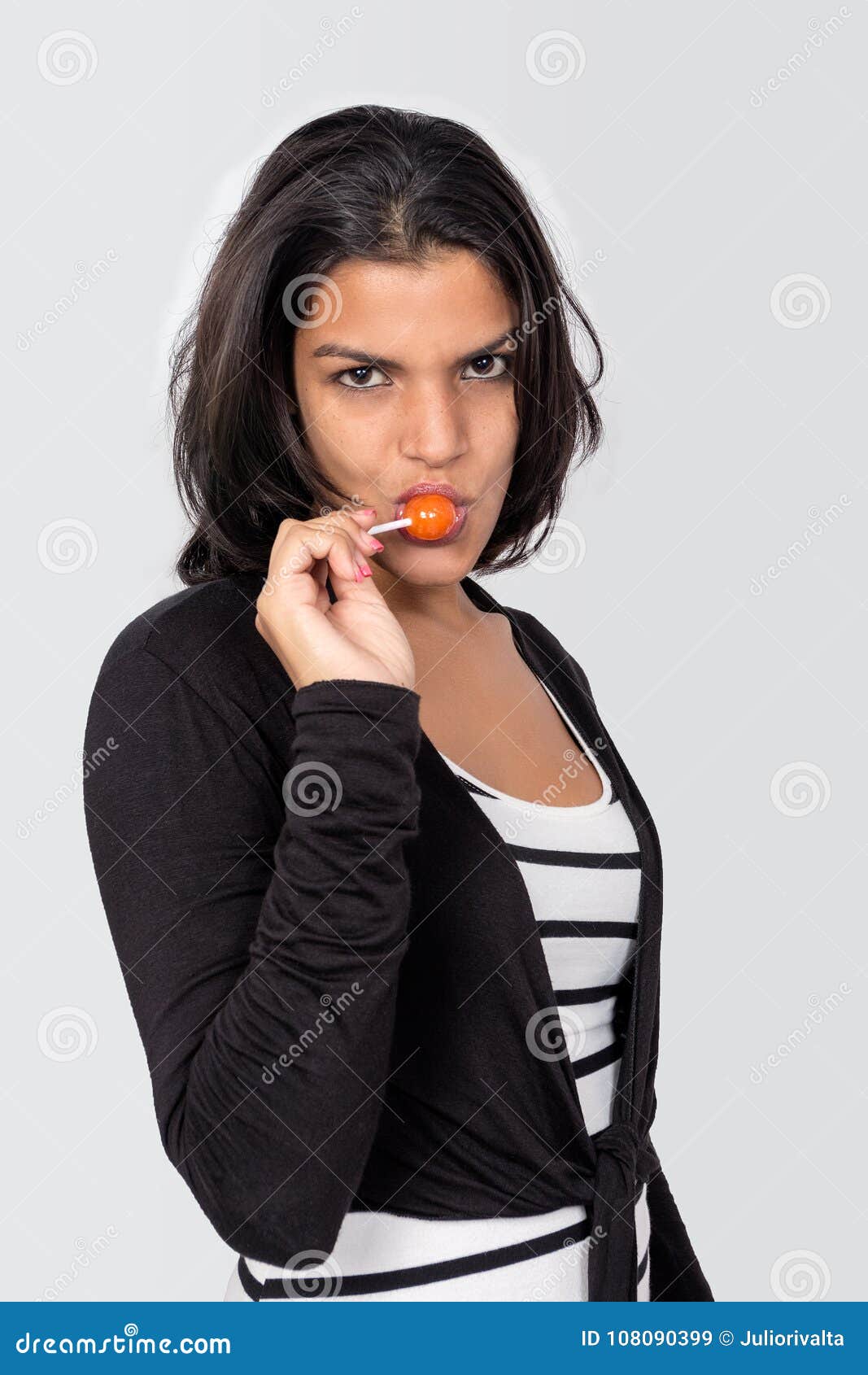 Young Black Haired Girl With A Candy Stock Image Image Of Closeup