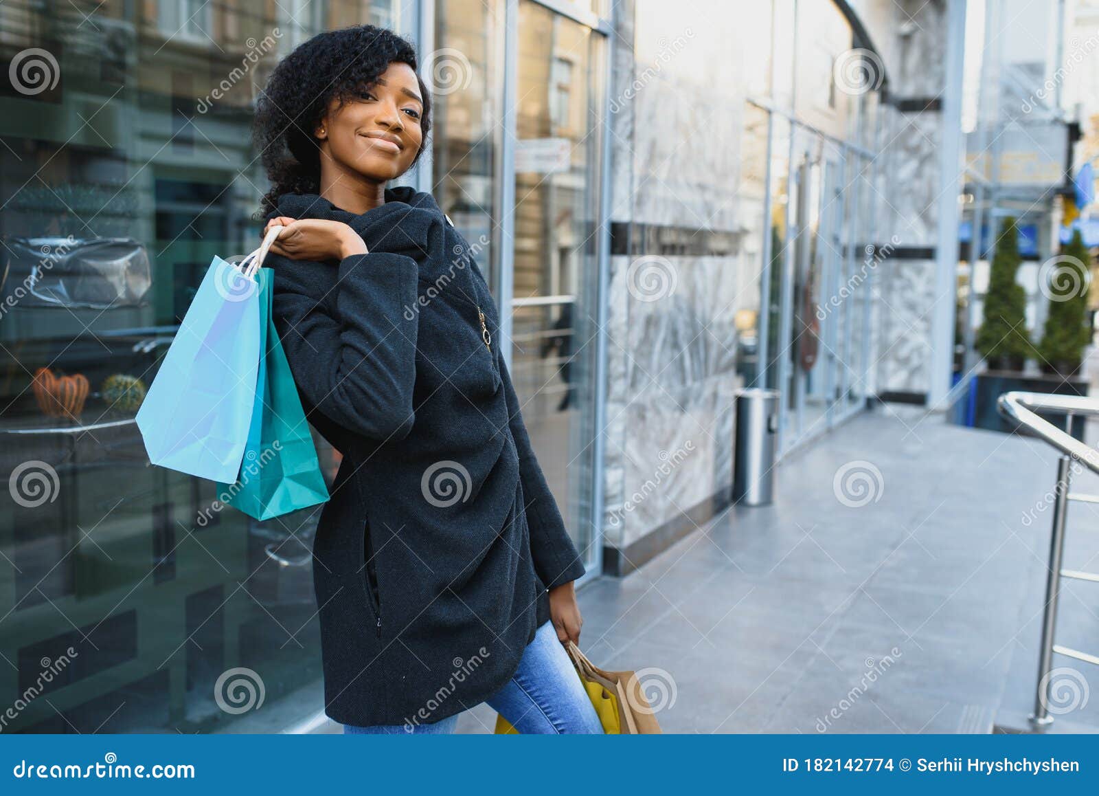 African American Woman Shopping. Seasonal Discounts Stock Photo - Image ...