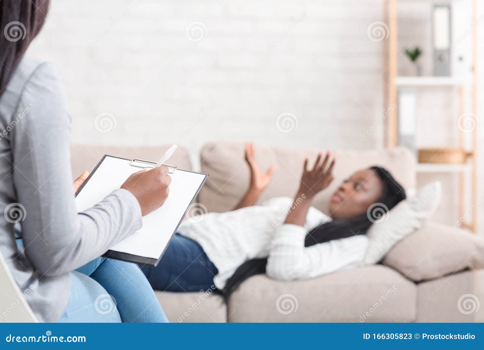 Young Black Woman Lying on Couch at Psychotherapist`s Office Stock ...