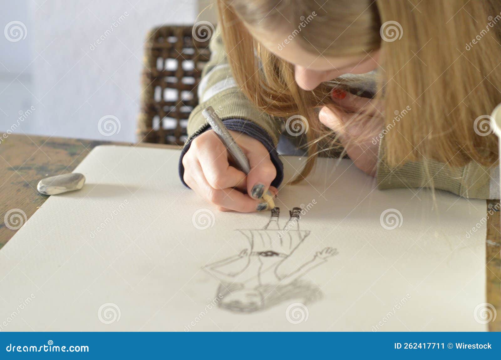 Young Blond Girl Drawing on a Paper Stock Image Image of person