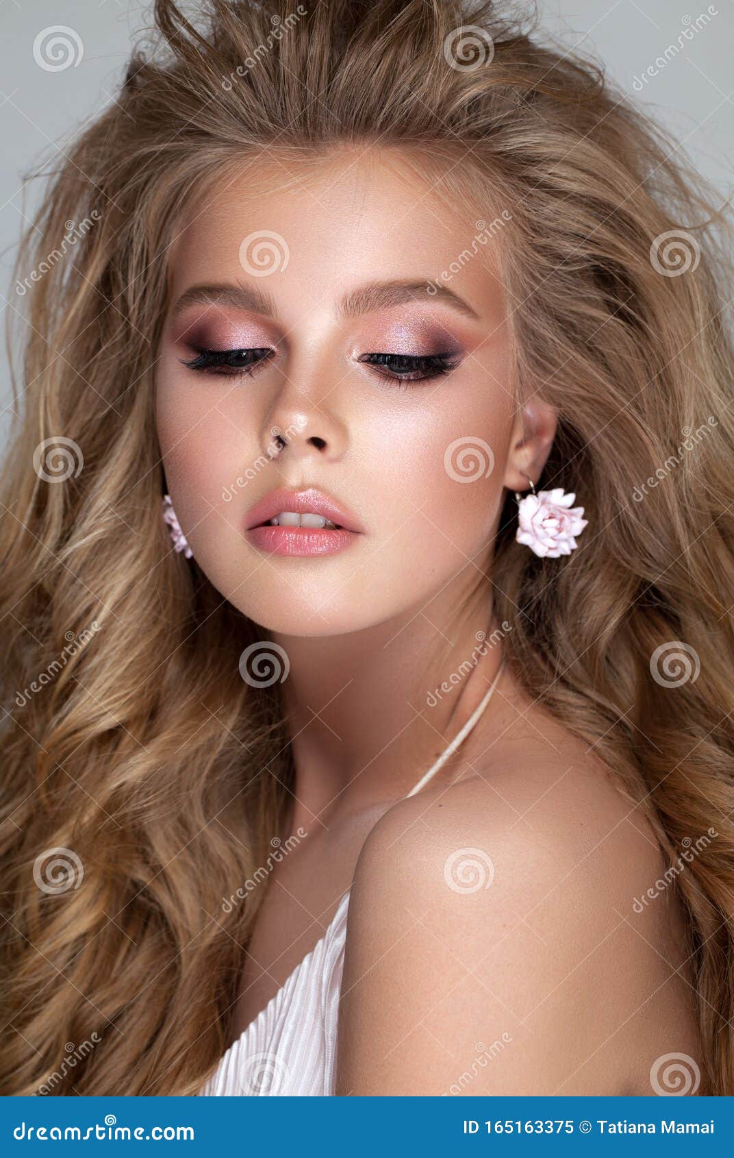 Young Blond Girl with Gentle Bridal Makeup, Perfect Skin, Volume Hairstyle  and Closed Eyes. White Earrings and Dress Stock Image - Image of  accessories, eyeliner: 165163375