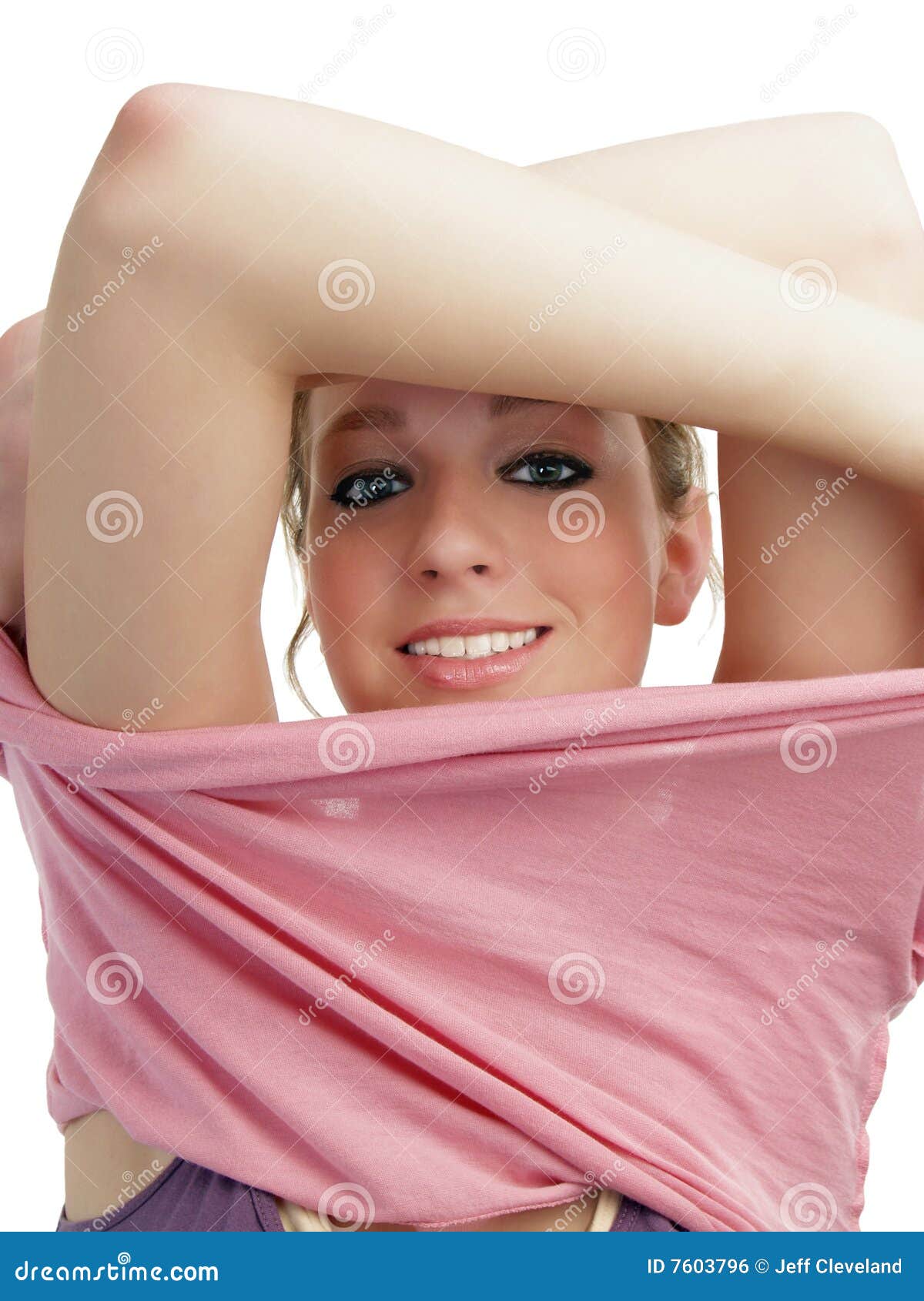 Young Blond Woman Removing Outer Shirt Smiling Stock Photo Image of